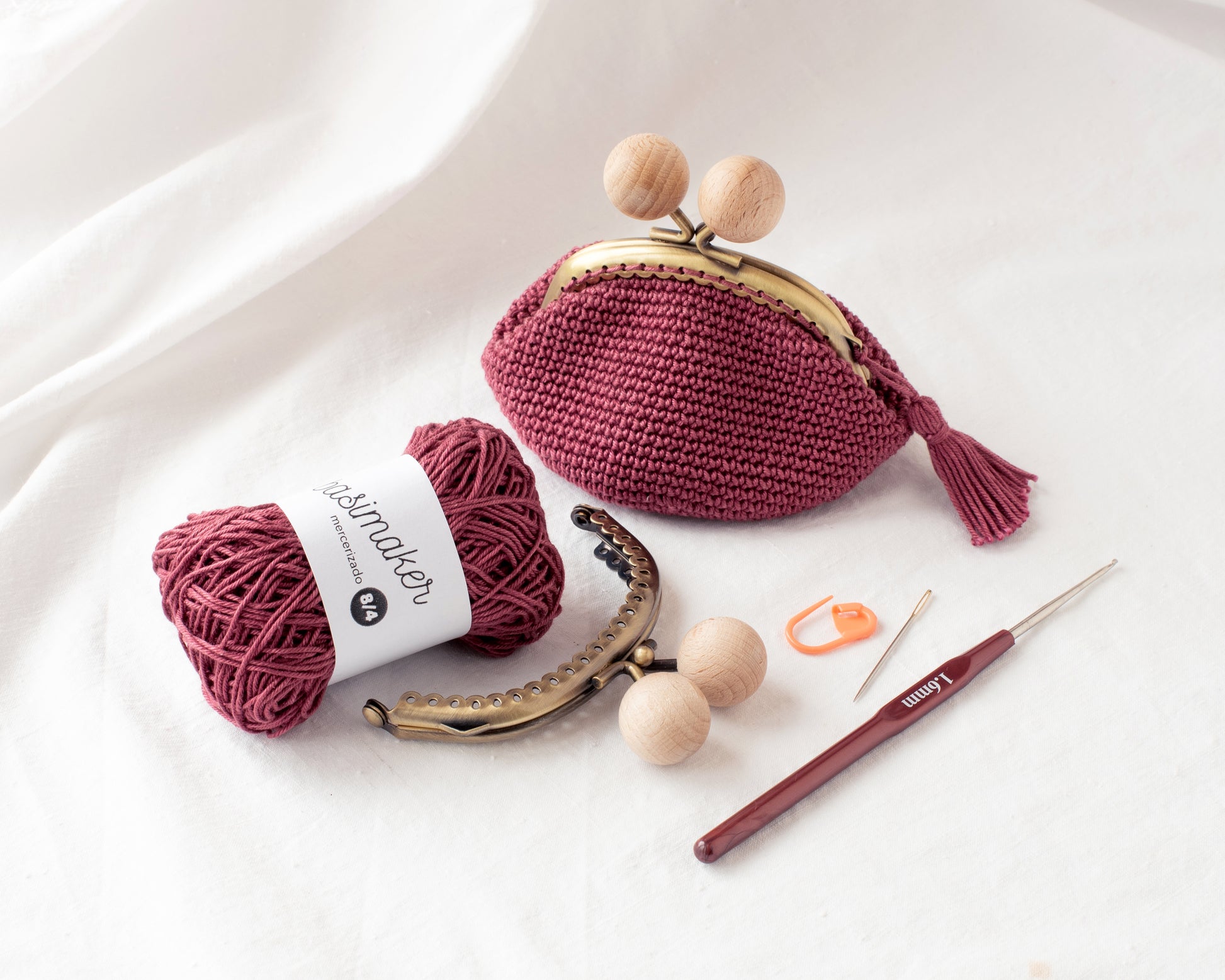 kit con materiales para hacer un monedero de crochet de boquilla redonda de metal y bolas de madera
